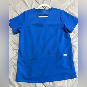 Figs small scrub shirt. 3 pocket, in royal blue.
